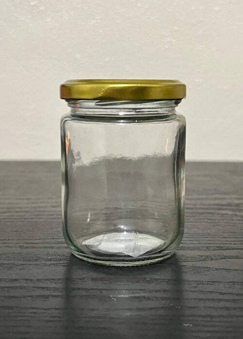 Frasco con tapa dorada